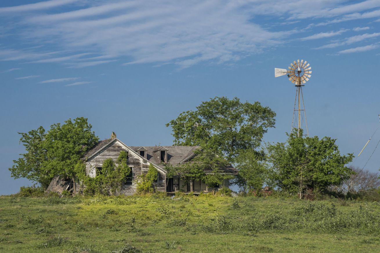 Deserted Home and windmill outside, outside Brenham, Texas in Washington County, Hill Country Texas