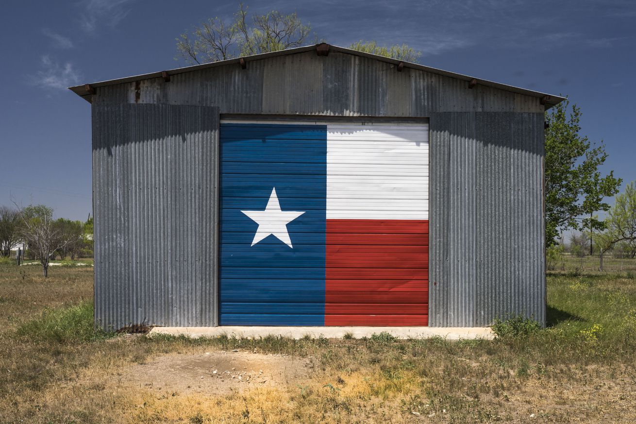 Aluminum shed boasts Texas Lone Star Flag, Texas