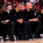 Houston Rockets coaches on bench