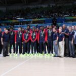 Aug 21, 2016; Rio de Janeiro, Brazil; USA basketball players and staff pose for a picture after winning the gold medal in the men's basketball gold medal match during the Rio 2016 Summer Olympic Games at Carioca Arena 1. Mandatory Credit: David E. Klutho-USA TODAY Sports
