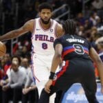Philadelphia 76ers forward Paul George (8) dribbles defended by Detroit Pistons forward Ausar Thompson (9)