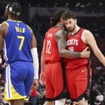 Houston Rockets center Steven Adams (12) talks with center Alperen Sengun (28) after a play during the third quarter against the Golden State Warriors at Toyota Center.