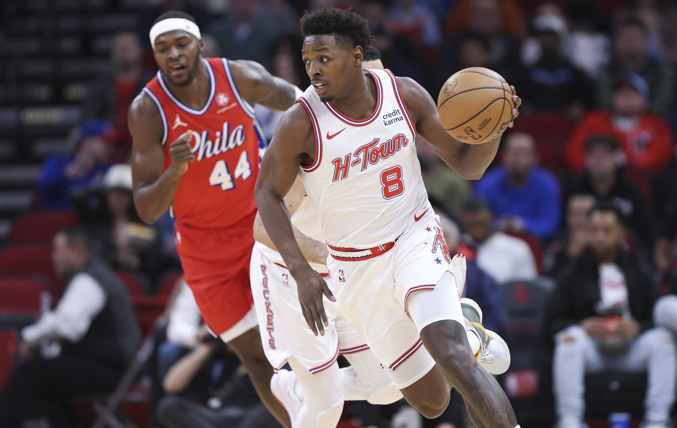 Dec 29, 2023; Houston, Texas, USA; Houston Rockets forward Jae'Sean Tate (8) drives with the ball on a fast break during the first quarter against the Philadelphia 76ers at Toyota Center. Mandatory Credit: Troy Taormina-USA TODAY Sports
