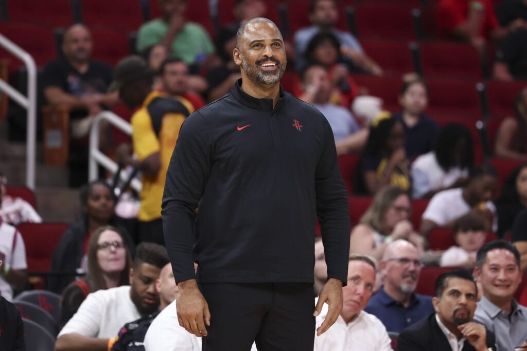 Oct 6, 2025; Houston, Texas, USA; Houston Rockets Head Coach Ime Udoka smiles during the third quarter against the Atlanta Hawks at Toyota Center. Mandatory Credit: Troy Taormina-Imagn Images