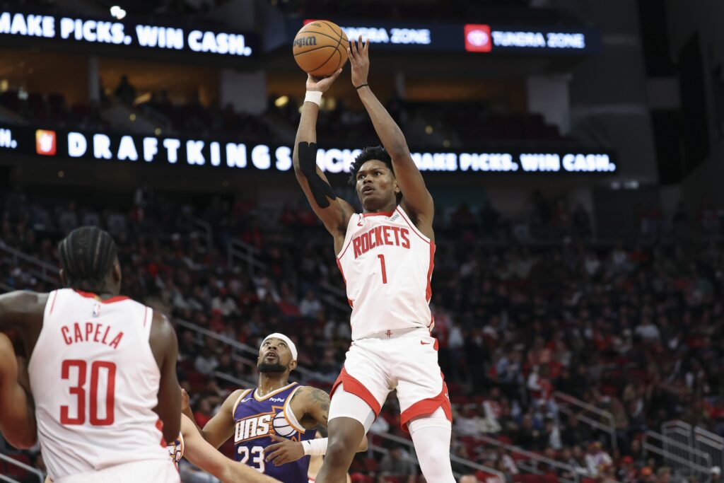 Houston Rockets guard Amen Thompson (1) shoots the ball during the second quarter against the Phoenix Suns at Toyota Center.