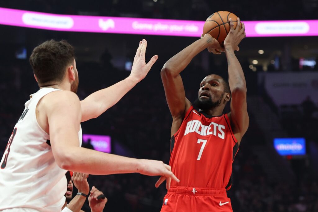  Houston Rockets forward Kevin Durant (7) shoots the ball over Portland Trail Blazers center Donovan Clingan (23) during the first half at Moda Center.